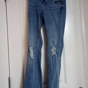 Fashion Nova Light Blue Distressed Flare Jeans